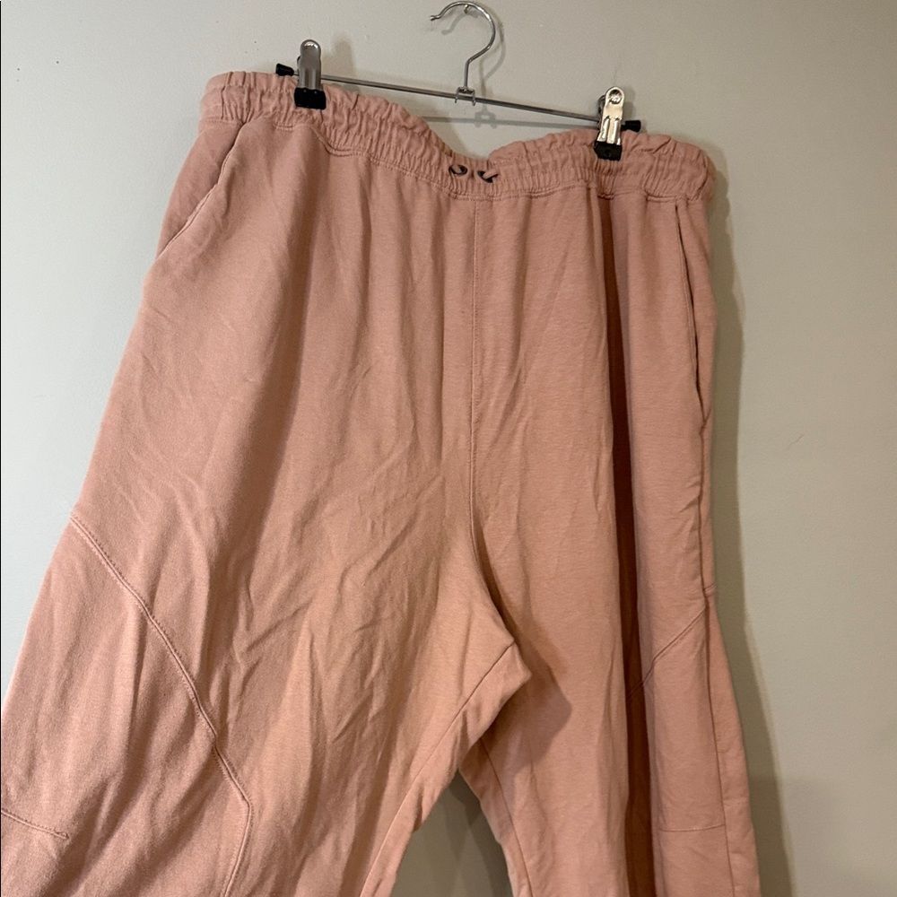 Free People movement dusty rose colored joggers with ankle zip and drawstring - Picture 7 of 13